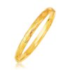 14k Yellow Gold Domed Bangle with a Weave Motif (6.00 mm)
